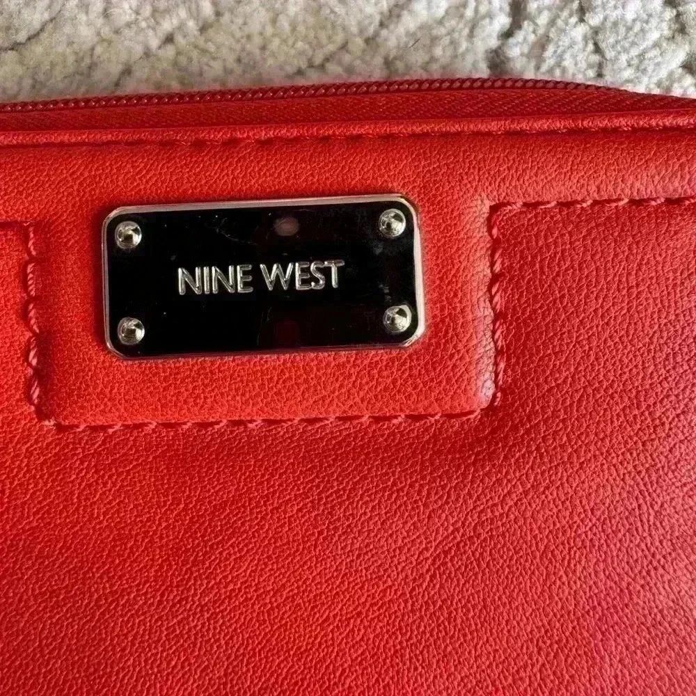 None west burnt orange zip around wallet